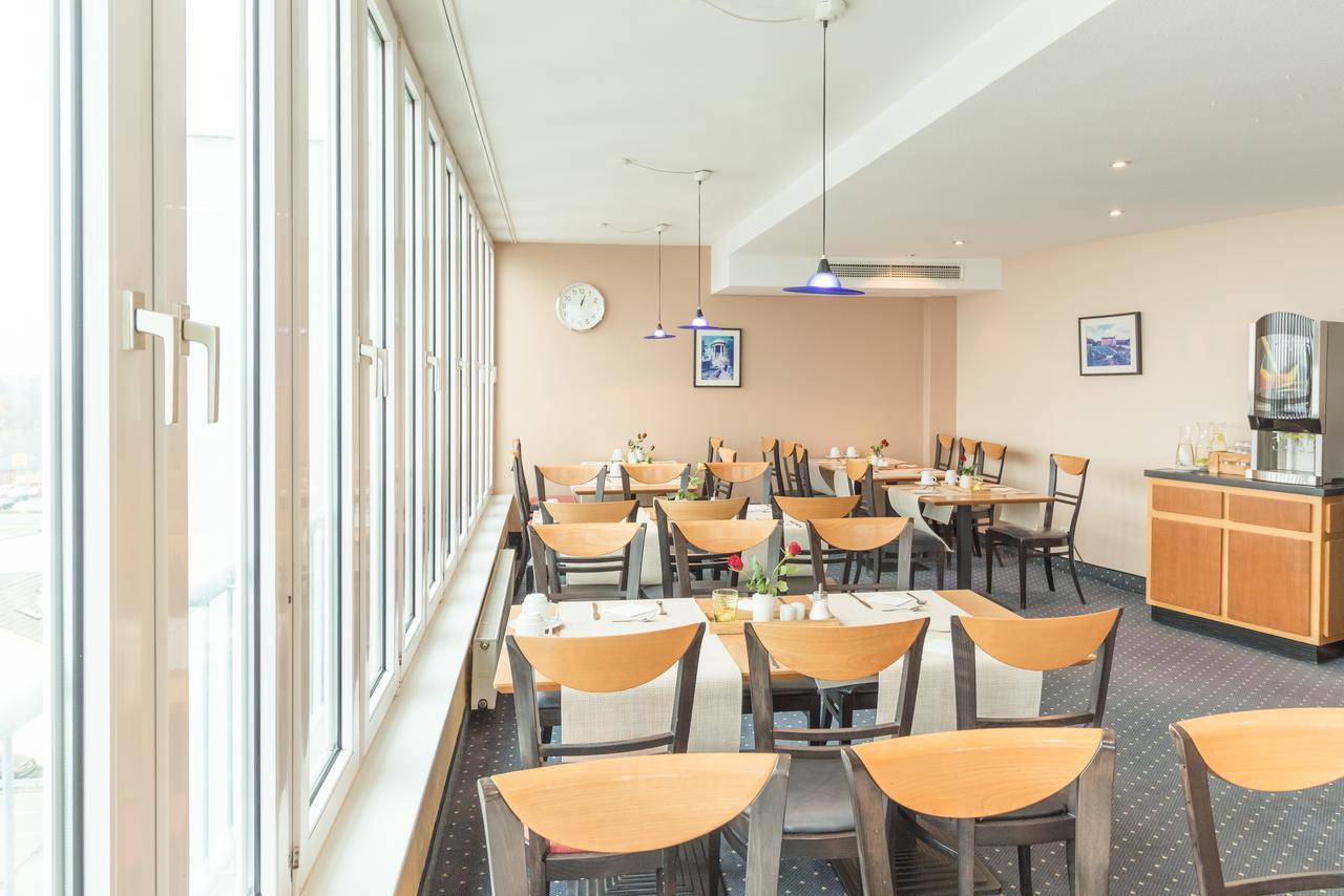 Arcadia Hotel Heidelberg Шветцинген Экстерьер фото